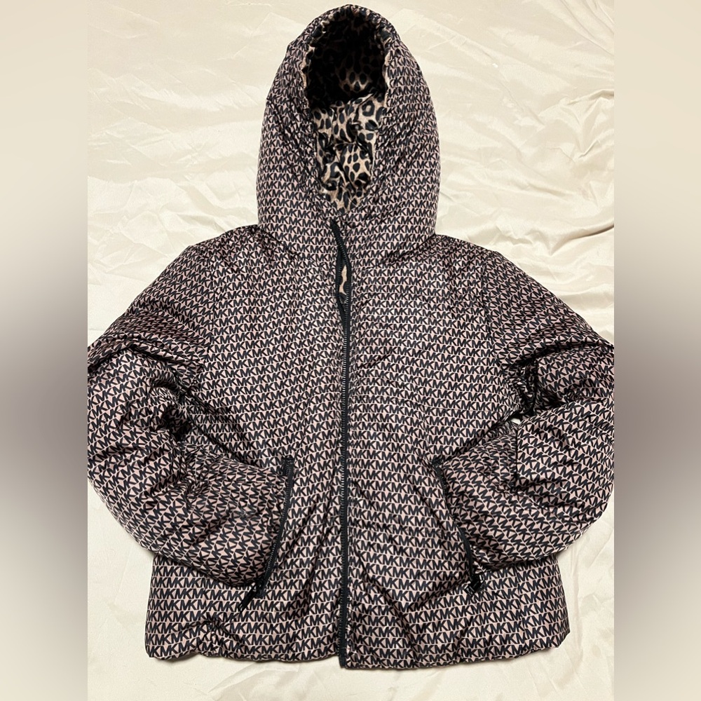 Michael Kors woman’s reversible puffer jacket size M.